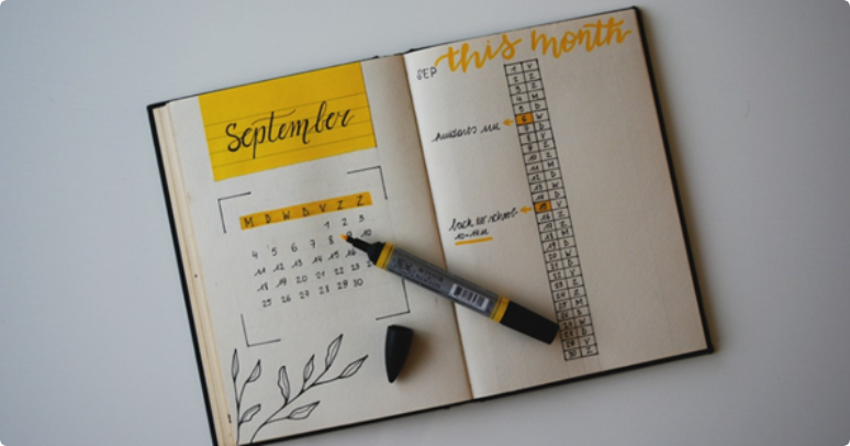 bullet journal filled out with calendar