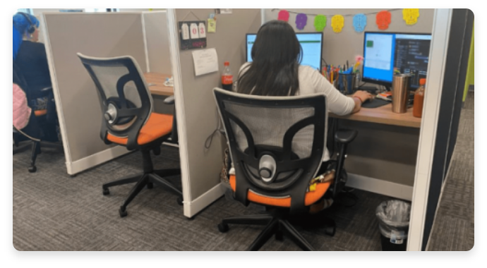 net pay employee working hard at their desk in office
