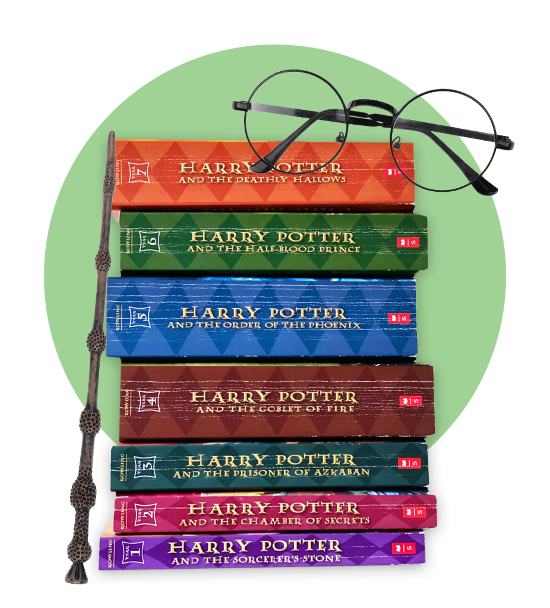 Harry Potter wand leaning against stack of Harry Potter books and Harry Potter glasses
