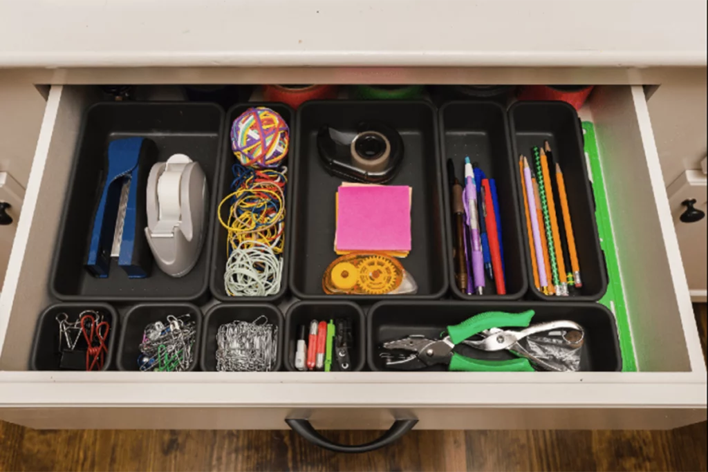 Organized kitchen junk drawer with drop-in organizers.